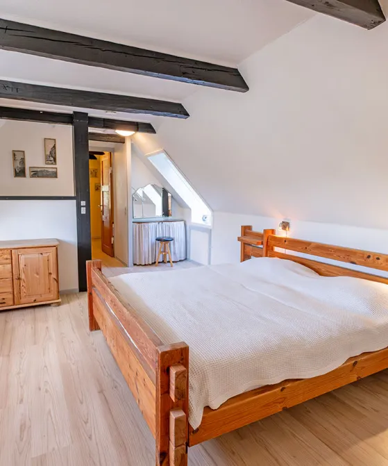 Værelse med dobbeltseng i Lille Skovholt