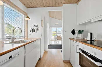 Veludstyret køkken i feriehus i Rø Golfhuse