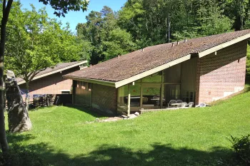 Hammershuse 1C med stor, grøn have og overdækket terrasse