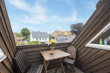 Hyggelig altan med terrassemøbler i Smedjen 