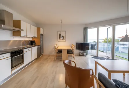 Opholdsrum i lejlighed for 4-6 personer i Gudhjem Søpark