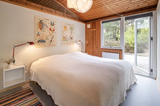 Ét ud af fire soveværelser i hovedhuset i Orion