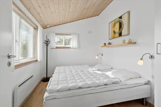 Soveværelse med to enkeltsenge i feriehus for 2-6 personer i Rø Golfhuse